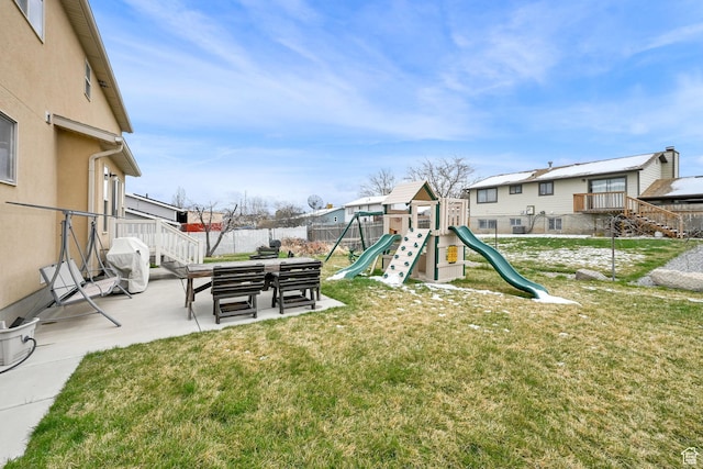 6007 W Jargon Way, Salt Lake City, UT 84118 - view of play area with fence, a patio, and a yard