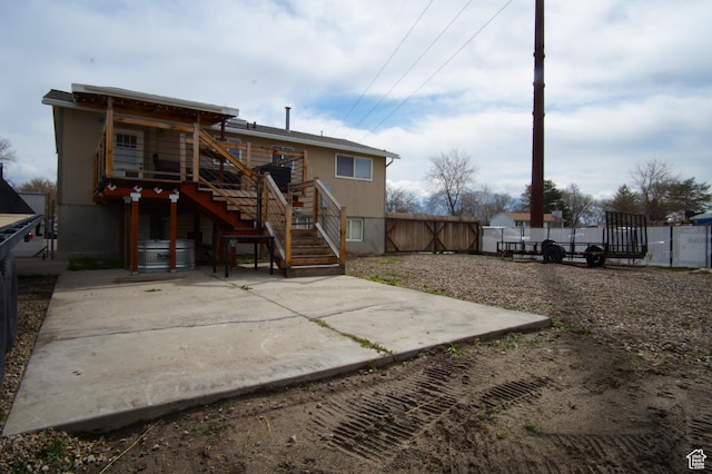 7598 S 2290 W, West Jordan, UT 84084 - back of house featuring stairway and a patio