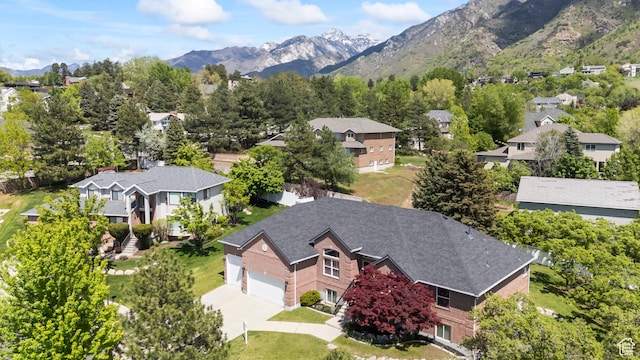 aerial perspective of suburban area featuring a mountain backdrop
