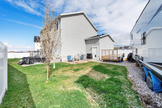 2080 E Colette St, Lake Point, UT 84074 - back of house with stucco siding and a patio area