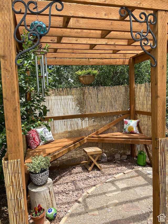view of patio featuring fence