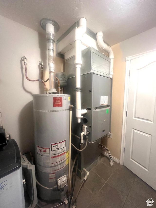 utility room with water heater
