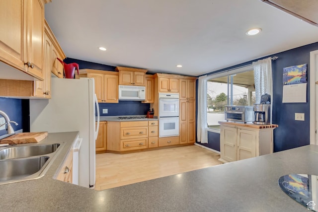 1055 E Chevy Chase Dr S, Murray, UT 84117 - kitchen with white appliances, recessed lighting, a sink, light wood-style floors, and light brown cabinetry