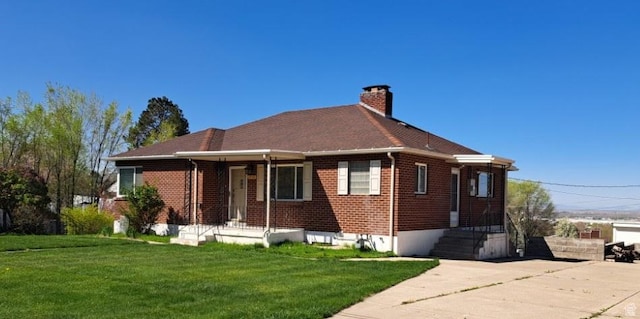 2928 S 575 W, Bountiful, UT 84010 - exterior space featuring a lawn, brick siding, and a chimney