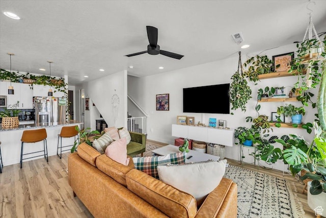 687 S Guy Ln Unit 1, Ivins, UT 84738 - living area with stairway, a ceiling fan, visible vents, light wood-style floors, and recessed lighting