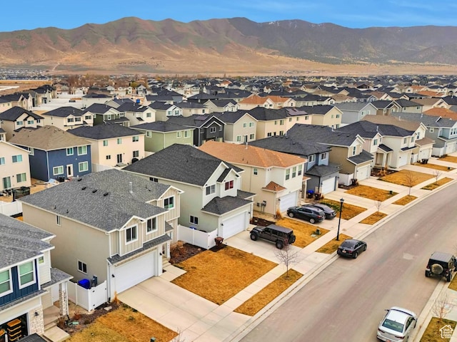 birds eye view of property featuring a residential view and a mountain view
