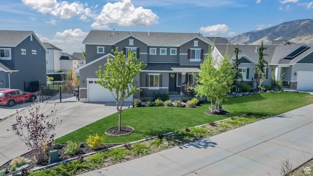 169 E Olivia Ln, Saratoga Springs, UT 84045 - view of front of house with a residential view, stucco siding, concrete driveway, stone siding, and a garage