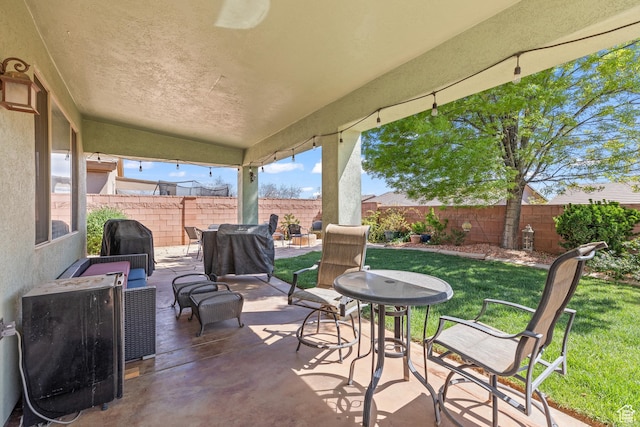 3352 E Sweetwater Springs Dr, Washington, UT 84780 - view of patio / terrace with a fenced backyard, outdoor dining area, and a grill