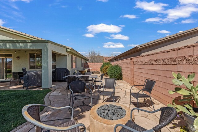3352 E Sweetwater Springs Dr, Washington, UT 84780 - view of patio featuring outdoor dining area, area for grilling, and fence