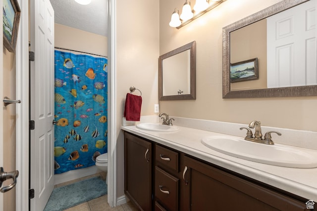 3352 E Sweetwater Springs Dr, Washington, UT 84780 - full bath featuring double vanity, a sink, toilet, and tile patterned flooring