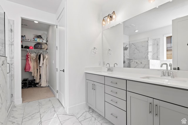 698 W Cypress Umber Dr, St George, UT 84790 - full bathroom with a marble finish shower, marble finish floor, a sink, and a walk in closet