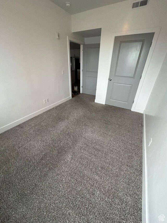 875 S Depot St E Unit C307, Clearfield, UT 84015 - unfurnished bedroom with baseboards and carpet floors