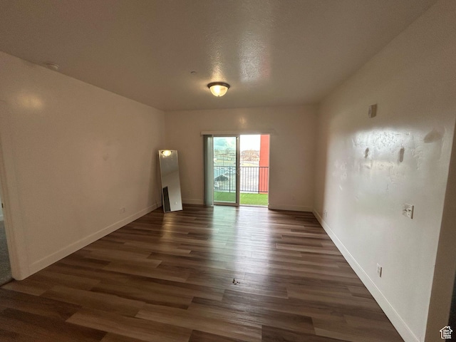 875 S Depot St E Unit C307, Clearfield, UT 84015 - empty room with baseboards and wood finished floors