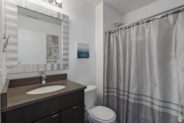 1051 W Rooftop Dr S Unit 401, Midvale, UT 84047 - full bath featuring visible vents, toilet, a shower with shower curtain, and vanity