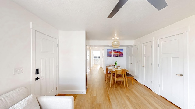 2527 W 500 S Unit 1, Springville, UT 84663 - dining room featuring light wood-type flooring, a textured ceiling, baseboards, and ceiling fan