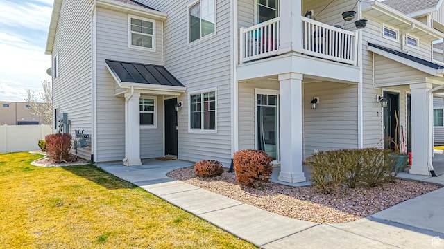 2527 W 500 S Unit 1, Springville, UT 84663 - entrance to property featuring a balcony, metal roof, fence, a standing seam roof, and a lawn