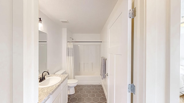 2527 W 500 S Unit 1, Springville, UT 84663 - bathroom with tile patterned flooring, vanity, toilet, a textured ceiling, and shower / bath combo