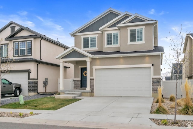 1710 S Prevedel Dr, West Haven, UT 84401 - craftsman inspired home featuring stone siding, driveway, fence, a garage, and stucco siding