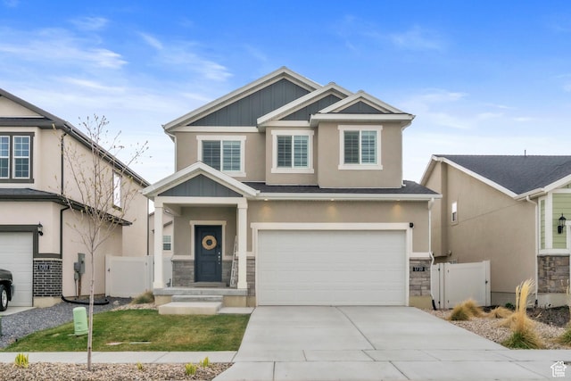 1710 S Prevedel Dr, West Haven, UT 84401 - craftsman house featuring concrete driveway, stucco siding, fence, a gate, and a garage
