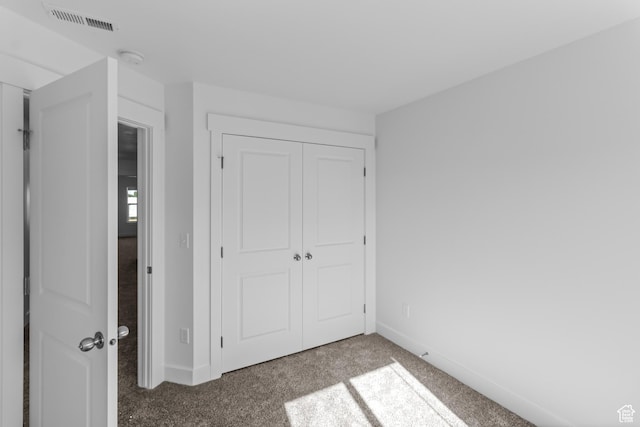3175 S 204 W, Nibley, UT 84321 - unfurnished bedroom with a closet, carpet floors, visible vents, and baseboards