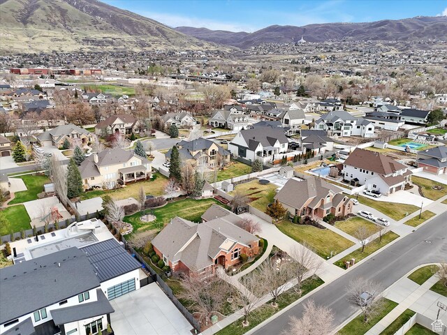 bird's eye view featuring a mountain view and a residential view