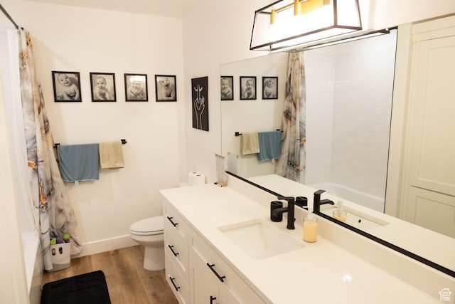 686 N 275 W Unit 1, La Verkin, UT 84745 - full bathroom with toilet, vanity, wood finished floors, shower / tub combo, and baseboards