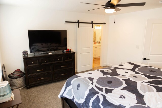 686 N 275 W Unit 1, La Verkin, UT 84745 - bedroom featuring ensuite bathroom, a barn door, a ceiling fan, and light colored carpet
