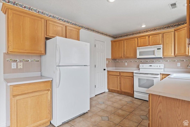 1192 E 440 N, Spanish Fork, UT 84660 - kitchen with white appliances, tasteful backsplash, recessed lighting, light countertops, and light tile patterned floors
