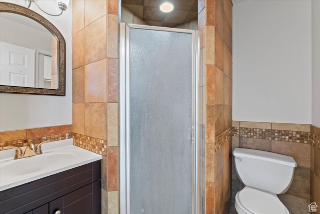 1192 E 440 N, Spanish Fork, UT 84660 - full bath featuring tile walls, vanity, a shower stall, and wainscoting