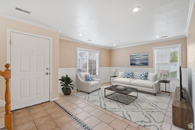 1192 E 440 N, Spanish Fork, UT 84660 - living room featuring tile patterned floors, recessed lighting, a wainscoted wall, and ornamental molding
