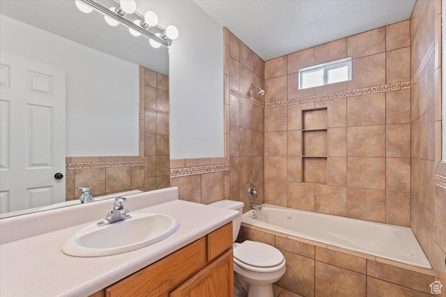 1192 E 440 N, Spanish Fork, UT 84660 - full bathroom featuring tile walls, tiled shower / bath combo, and vanity