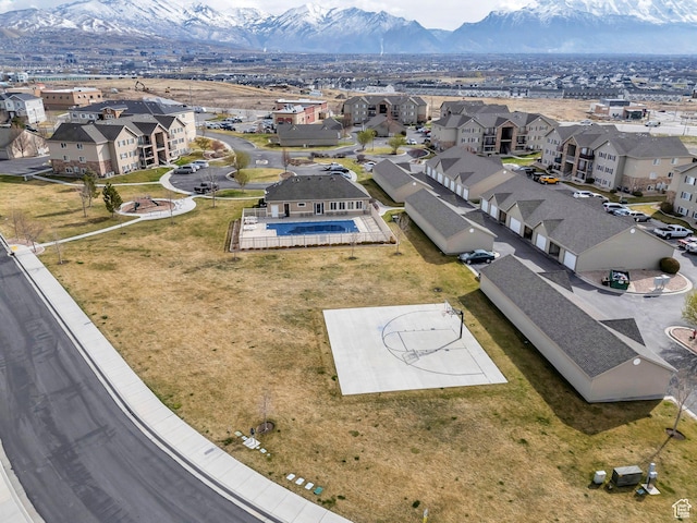 aerial view of residential area with mountains