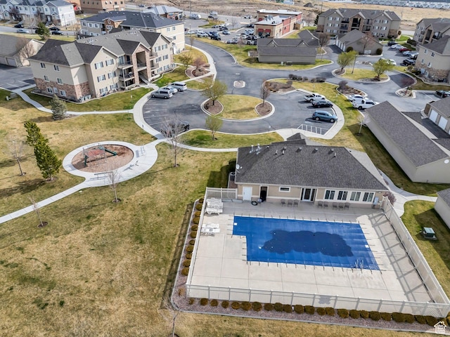 aerial perspective of suburban area with a pool