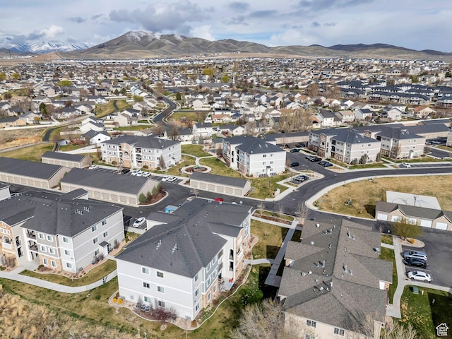 aerial perspective of suburban area featuring a mountainous background