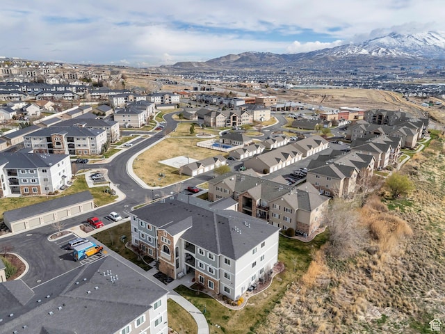 aerial perspective of suburban area featuring a mountain backdrop