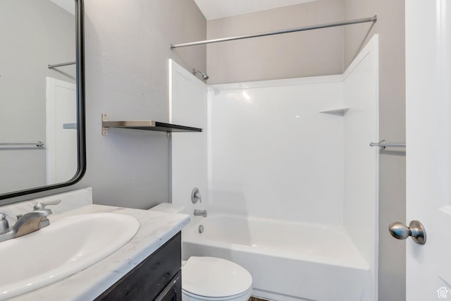 bathroom featuring toilet, shower / tub combination, and vanity