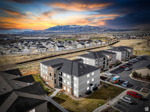 aerial perspective of suburban area with a mountain backdrop