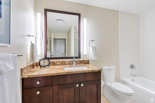 45 W S Temple Unit 603, Salt Lake City, UT 84101 - bathroom featuring toilet, vanity, shower / bath combination, and visible vents