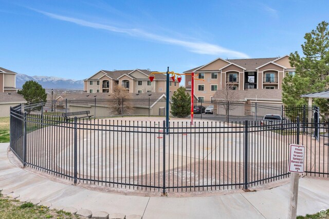 surrounding community featuring a residential view and fence