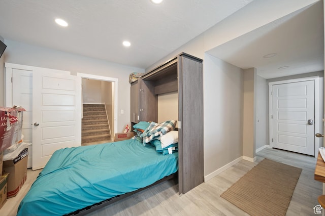 3724 E Long Ridge Dr, Eagle Mountain, UT 84005 - bedroom with baseboards, recessed lighting, and light wood-type flooring