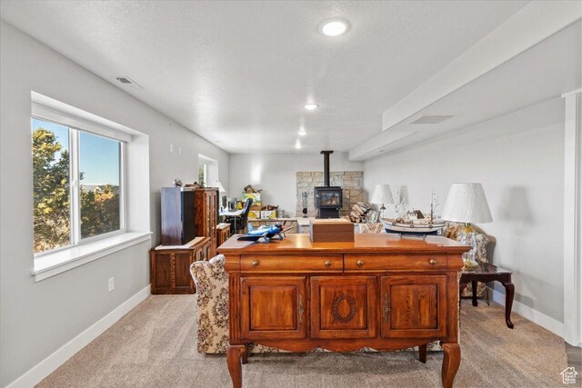 14440 N 11740 E, Mount Pleasant, UT 84647 - home office featuring light carpet, baseboards, a wood stove, and recessed lighting