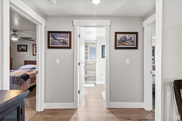 14440 N 11740 E, Mount Pleasant, UT 84647 - hallway featuring light wood-style flooring and baseboards