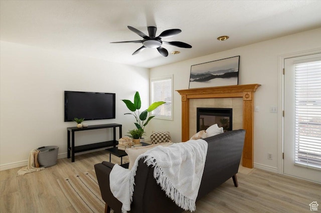 839 E 4315 S, Murray, UT 84107 - living room featuring light wood-style floors, a ceiling fan, and plenty of natural light