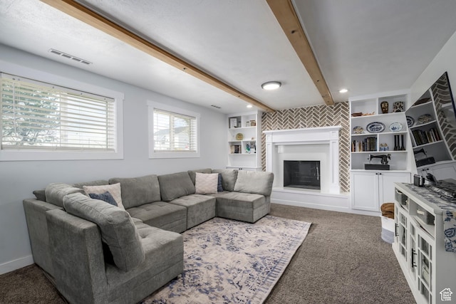 1155 E 300 N, American Fork, UT 84003 - living room with a fireplace with raised hearth, visible vents, carpet floors, baseboards, and beam ceiling