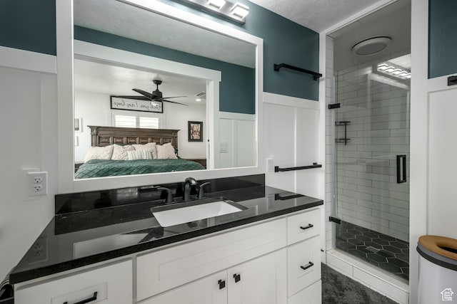 1155 E 300 N, American Fork, UT 84003 - ensuite bathroom with ceiling fan, connected bathroom, a shower stall, vanity, and wainscoting