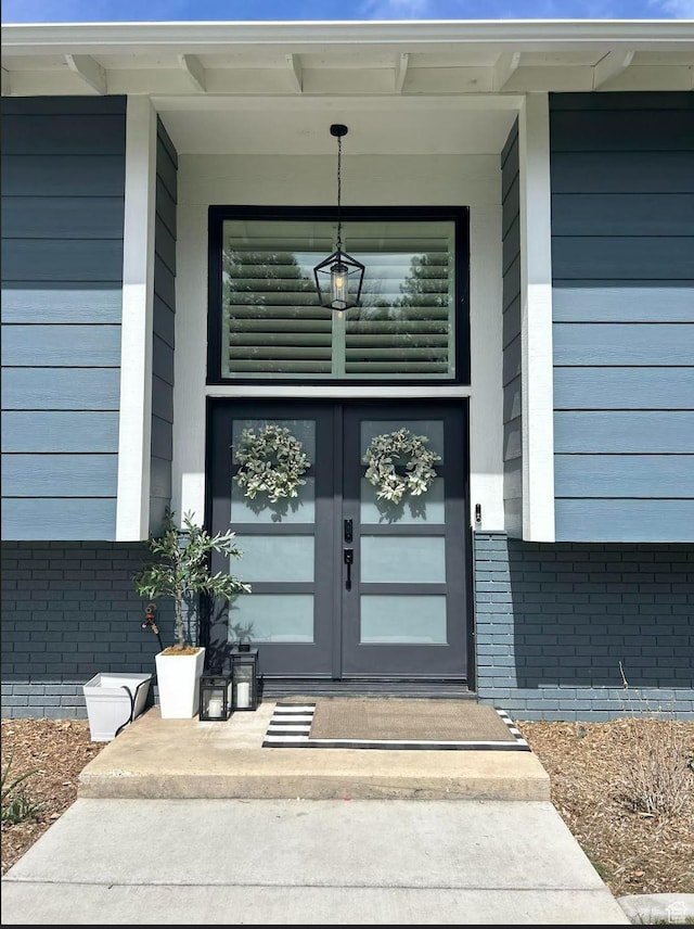 1155 E 300 N, American Fork, UT 84003 - doorway to property featuring brick siding and french doors