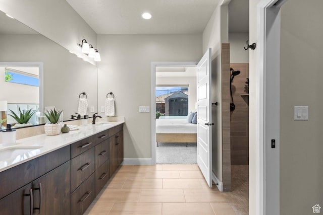 1867 W Grapevine, Hurricane, UT 84737 - bathroom with ensuite bathroom, healthy amount of natural light, a walk in shower, double vanity, and recessed lighting
