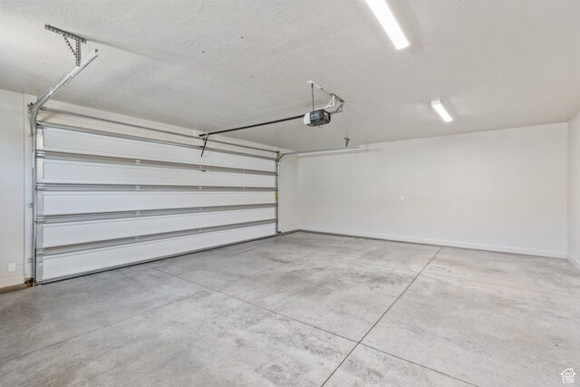 1867 W Grapevine, Hurricane, UT 84737 - garage with a garage door opener and baseboards