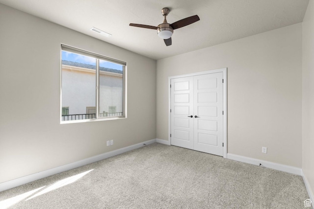 1867 W Grapevine, Hurricane, UT 84737 - unfurnished bedroom featuring carpet, baseboards, a closet, and ceiling fan