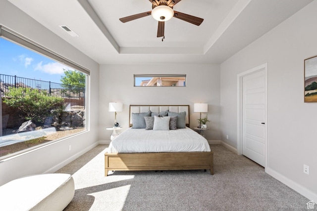 1867 W Grapevine, Hurricane, UT 84737 - carpeted bedroom with a tray ceiling, ceiling fan, and baseboards